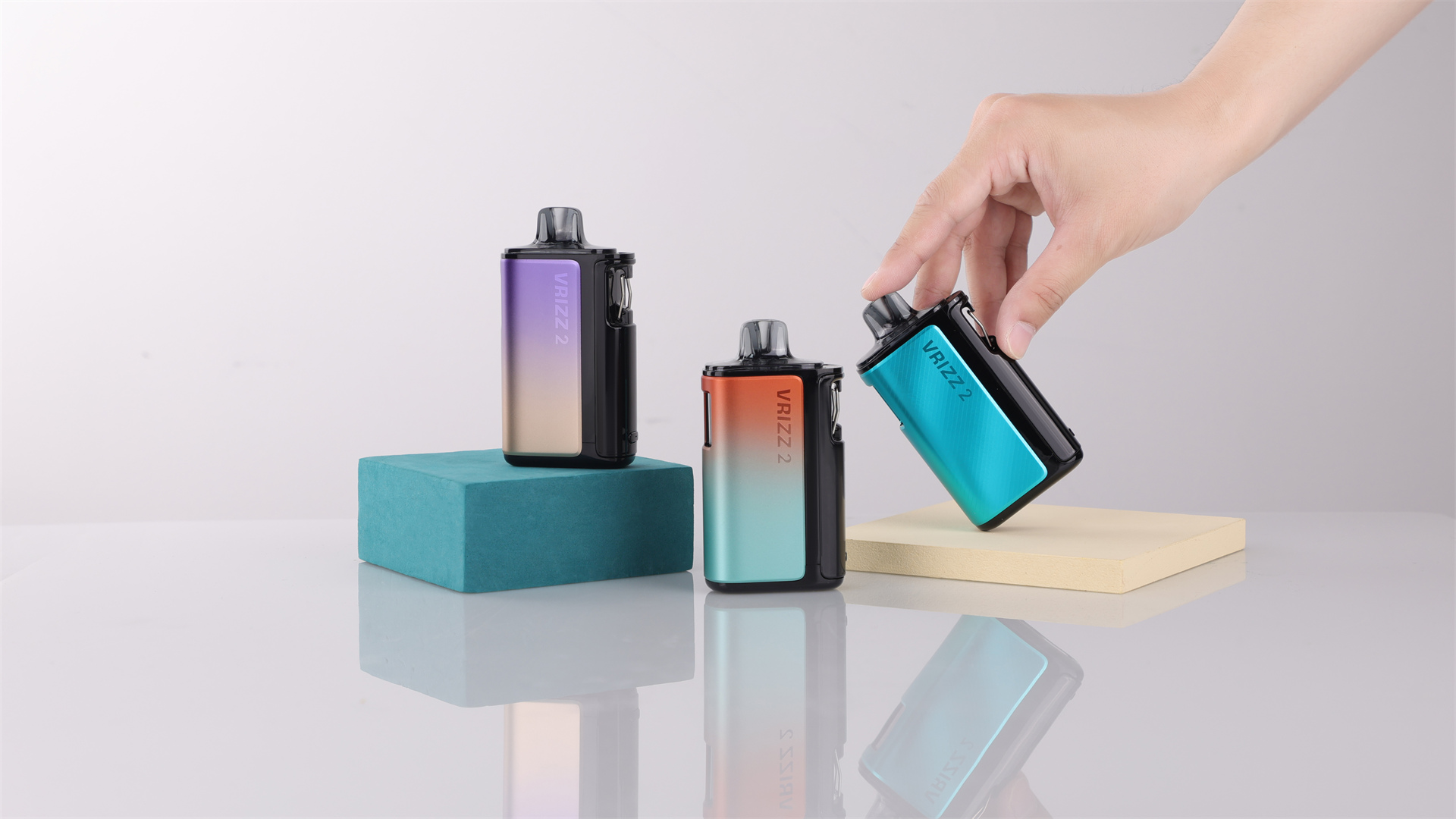 VOOPOO VRIZZ 2 pod kit product photography, featuring a massive 15 mL cartridge capacity, 1350 mAh high-density battery, 30 W max output, and dual mesh technology with ECO/NORM/TURBO modes for an elevated and long-lasting vaping experience.